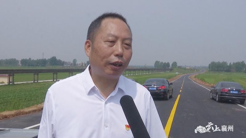 区交通局党组书记,局长 田玉林"通过这座桥的建设通车,襄北五个镇