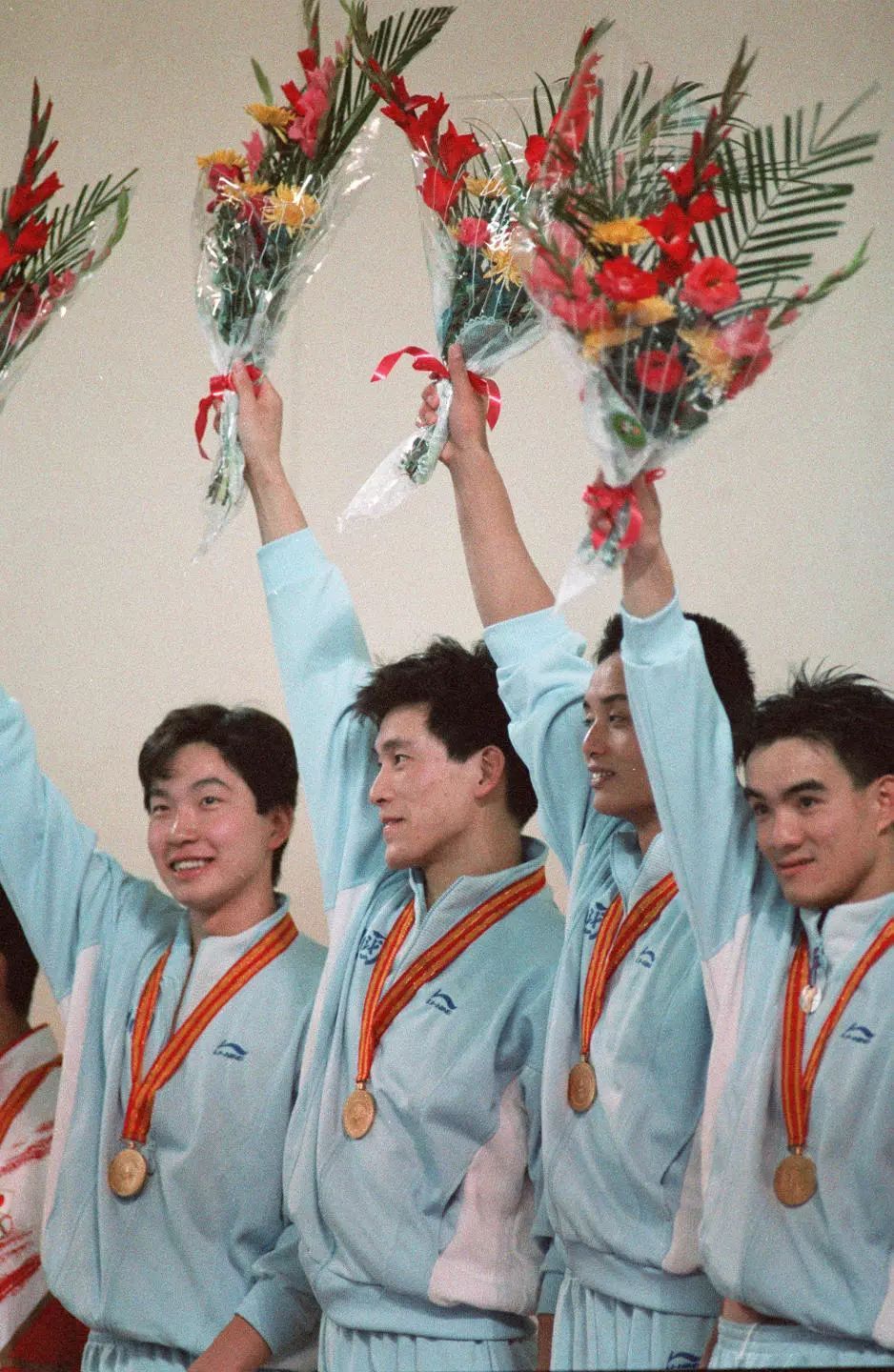 1990年9月,中国运动员林来久,陈剑虹,沈坚强,谢军获得北京亚运会男子4