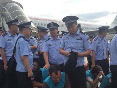 122名电信诈骗嫌疑人从柬埔寨押解回国