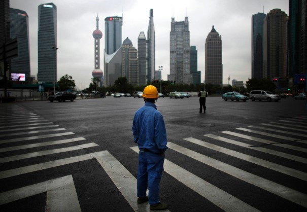 中国推进城市化需寻找新"工具":农民工不愿离家