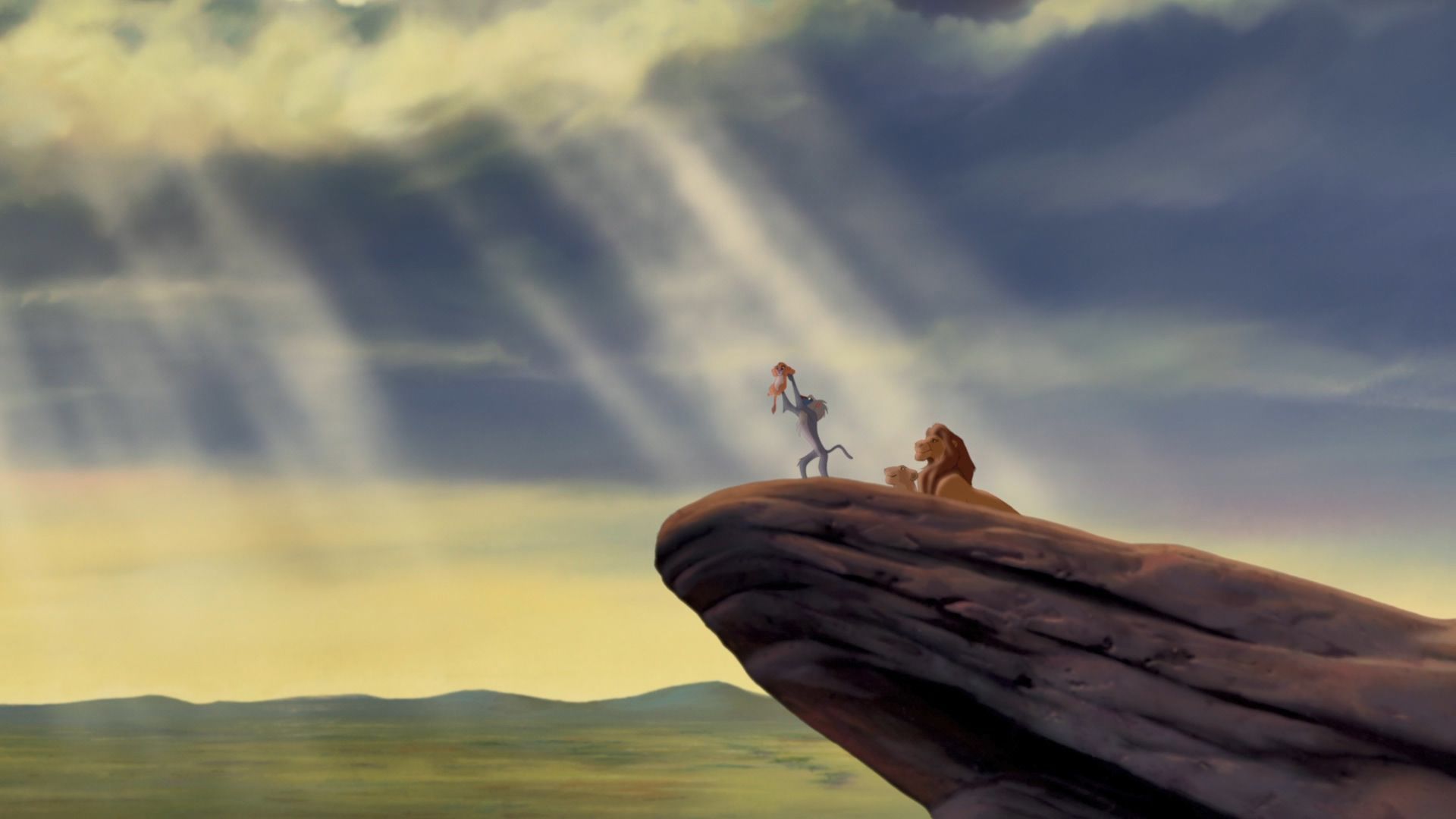 《狮子王》剧照:小辛巴在荣耀石上被高高举起17.