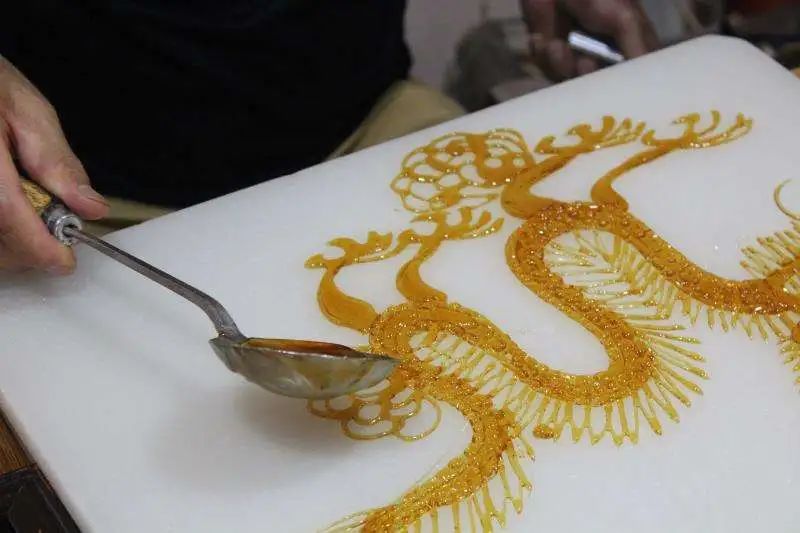 中国民间传统手工技艺糖画