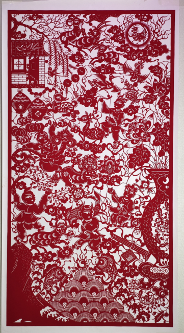 鄂州雕花剪纸迎新春十米长卷展空港新城美丽风貌