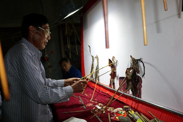 竹坪皮影戏高腔唱“十星”引领乡风好文明