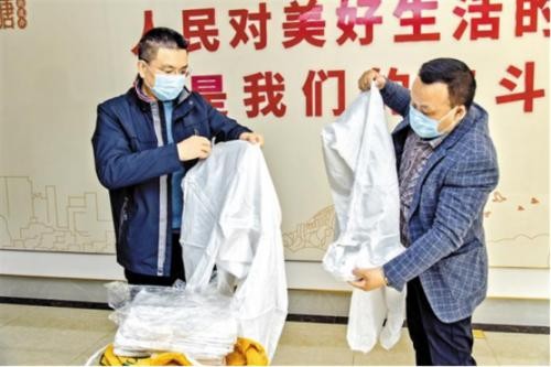 市劳模程时庆情系故乡