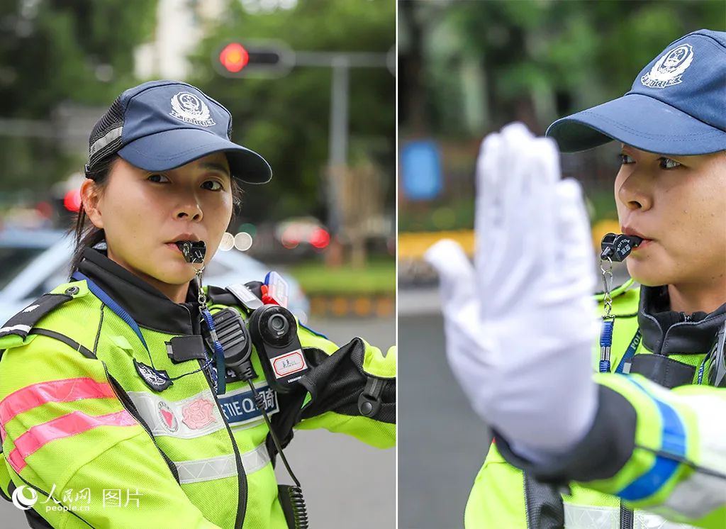 深圳市公安局交警支队机训大队二中队民警吴惠山正在路口指挥交通。人民网 王星摄