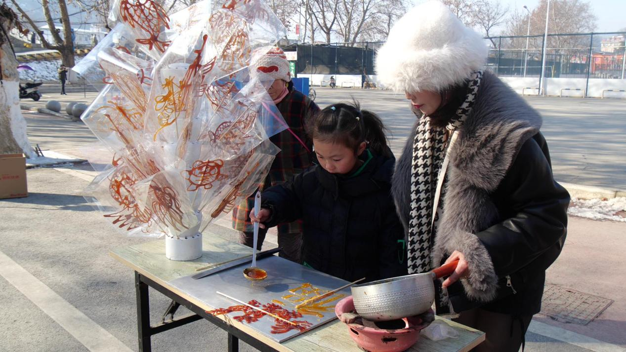 湖北南漳从糖画里觅一丝儿时味道