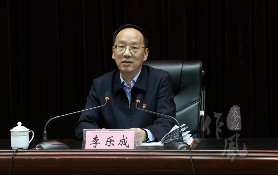 胡久明以"不忘初心,牢记使命"为主题,回顾了自己自1948年参加革命工作