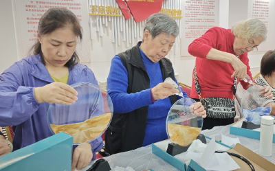 流沙绘就夕阳红 多彩非遗走进社区