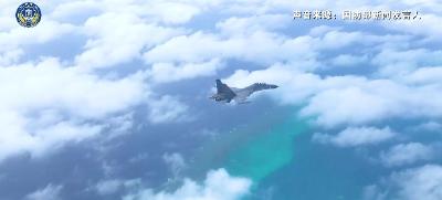 中国人民解放军南部战区位黄岩岛领海领空及周边区域组织战备警巡