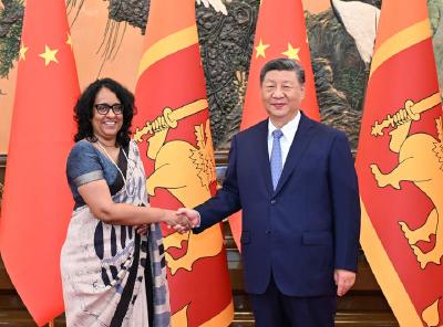 习近平会见斯里兰卡总理阿马拉苏里亚