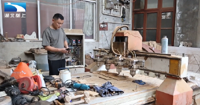 黄俊：退役军人成非遗传承人 用匠心唤醒土家吊脚楼