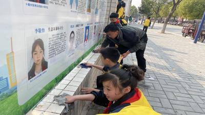 传承雷锋精神 携手靓洁校园 ——房县东城小学开展校园清洁志愿服务活动
