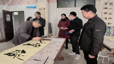 书法名家进校园 翰墨飘香薪火传——房县东城小学开展书法名家进校园活动