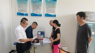 县公检中心与丹江口市公检中心交流学习