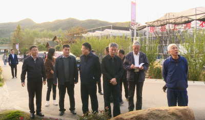 省三农问题研究会会长肖旭明一行来房调研