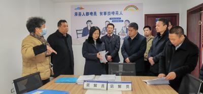 覃文萍来房调研法院工作