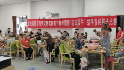 粽叶飘香迎端午！荆州区东城街道邻里共包幸福粽