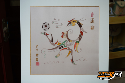 凤舞绿茵寄深情  荆州非遗传承人绣《凤蹴》助威“楚超”