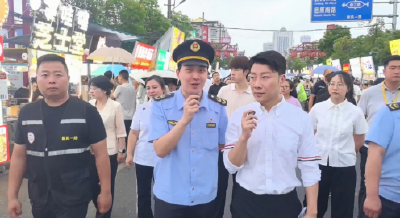 阳光直播守护烟火气 荆州“你点我检暨随机查餐厅”活动走进长大美食街