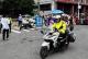 风雨中，湖北交警守护中考学子路
