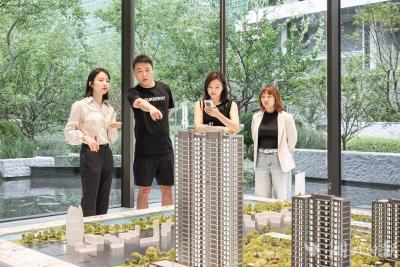 大雨浇不熄购房热情 楼市“火六月”有望接棒“红五月”