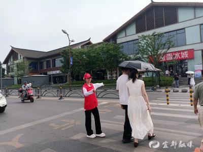 宜都20余名“红马甲”用汗水绘就景区最美风景线