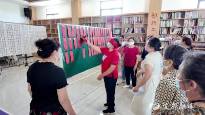 【网络中国节·端午】红花套社区举办“盲盒包粽”庆端午活动