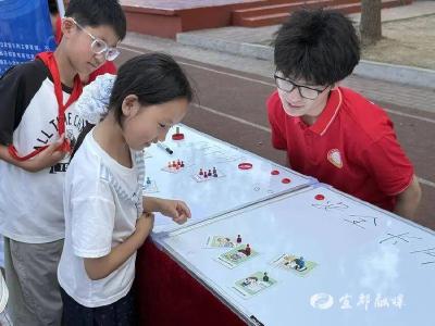 趣味闯关学知识 清朗网络护成长！“E法襄助·清朗襄阳”网络举报主题活动走进恒大名都小学