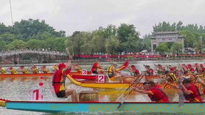 千帆竞渡金牛畔 百舸争流赛龙舟