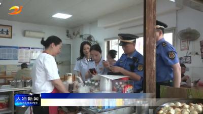 简讯：市城管执法局开展城镇垃圾处理费宣传活动