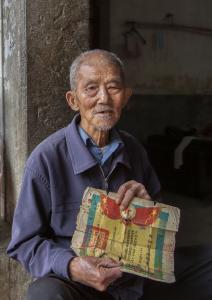 “是不是党费要交啦？”——94岁老党员周光生的最后一笔党费