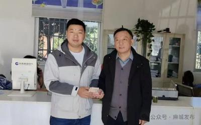 情系桑梓 爱洒菊乡