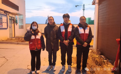 麻城“志愿红” 暖亮春运归途