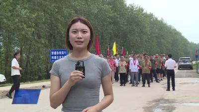穴：千人宣誓“红”遍长江大堤 主题党日别样“燃”