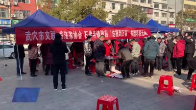 石佛寺镇：挥毫送春联 墨香添年味