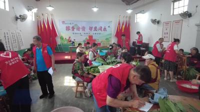 粽香传情 邻里同乐一武穴市万丈湖街道办事处新港社区开展“包粽子比赛”活动