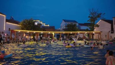 从"观赏"到"互动"  大金苏垴社区景观池的清凉蝶变 