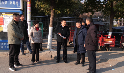 县领导调研九集镇街心十字路口交通优化工作