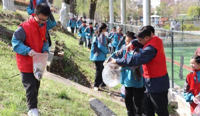 县实验中学开展爱护河湖志愿服务活动