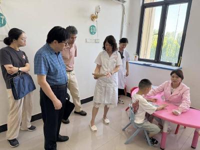 市残联评审小组对我县定点机构开展分级管理评审工作