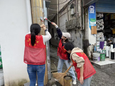 花石桥社区：铲除“城市牛皮癣”　共建洁净新家园