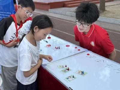 趣味闯关学知识 清朗网络护成长！“E法襄助·清朗襄阳”网络举报主题活动走进恒大名都小学