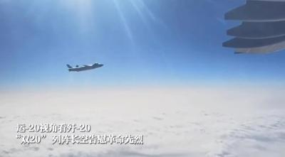 独家视频丨2架歼-20战机为接运英雄的运-20护航
