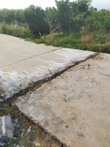 烈日灼烤路面“中暑”拱起 王湾社区“快修队”解民忧护平安