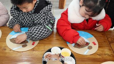 湖北老河口：童声话腊八 巧手暖寒冬 