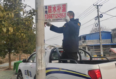 孝昌小河：开展“净墙面  亮环境”学雷锋志愿服务行动