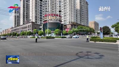 【高温下的劳动者】 大悟交警：不惧 “烤”验 “汗”卫平安