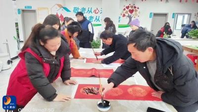 通羊镇古塔社区：统战聚合力 春联送暖迎新春