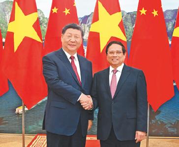 习近平会见越南总理范明政